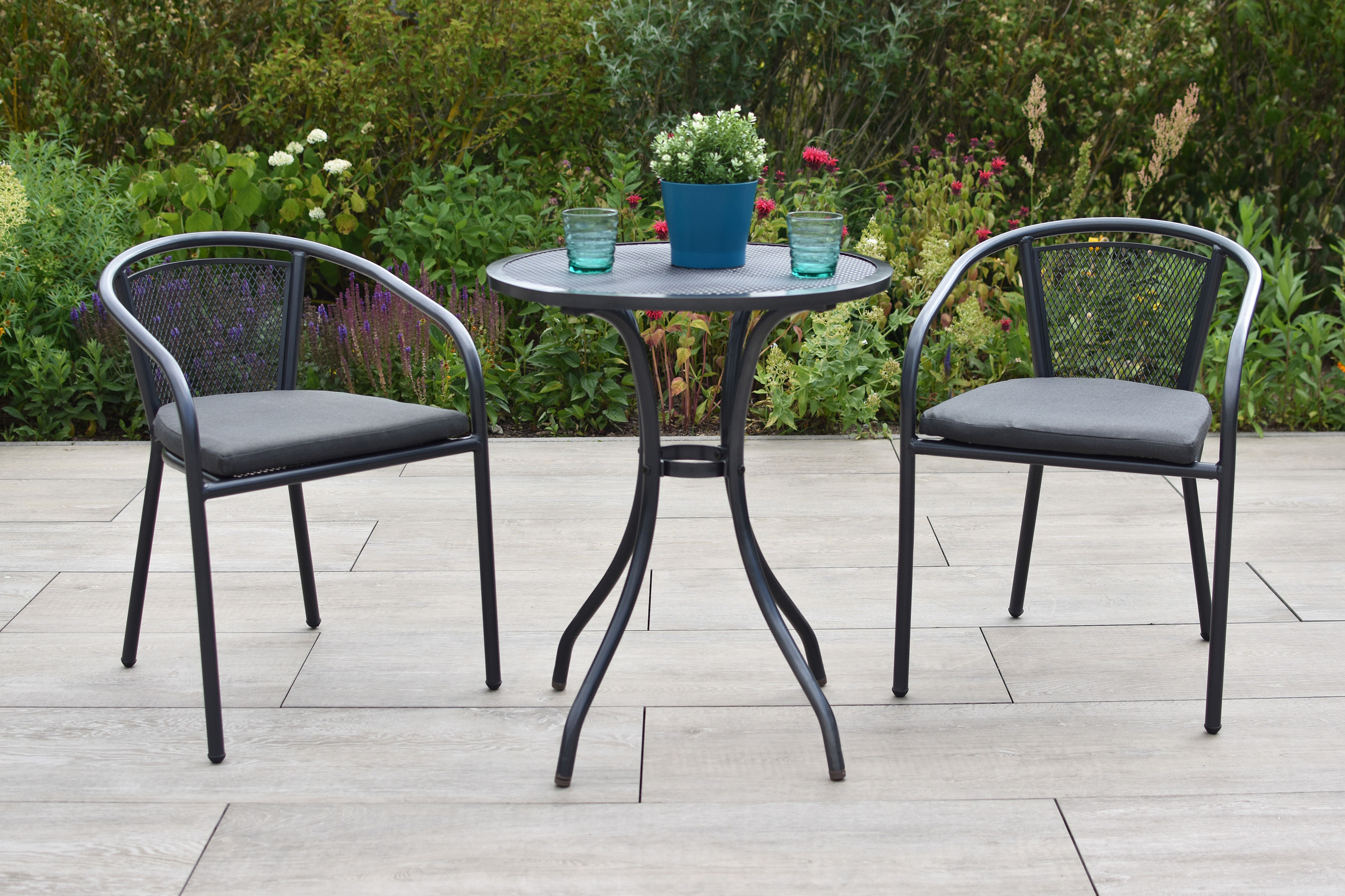 Delos Set 5tlg., 2 Stapelsessel, Tisch rund Ø 60 cm, inkl. Kissen