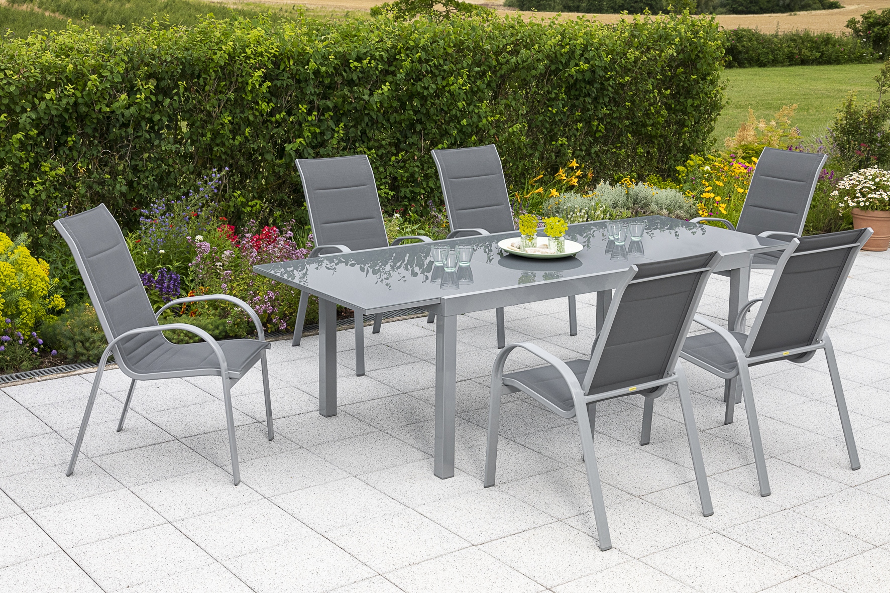 50358-309-3 Amalfi Set, 7 tlg., 6 Stapelsessel, Ausziehtisch 180/250 x 100 cm, grau